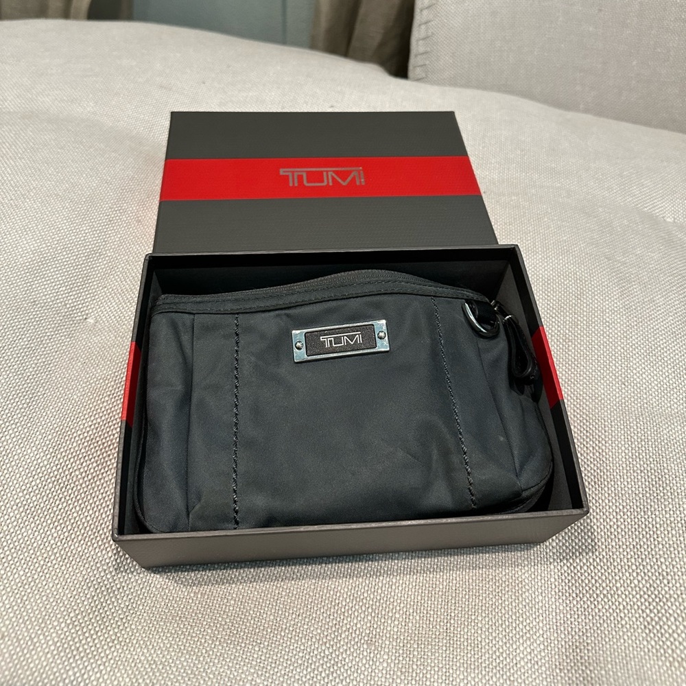 Tumi wristlet with card holder